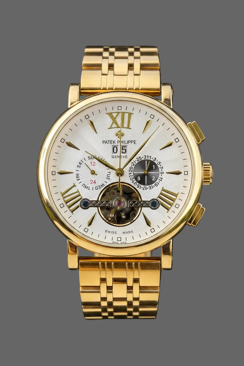 Gold-tone bracelet watch with a light dial, Roman-numeral accents and an open-heart detail.
