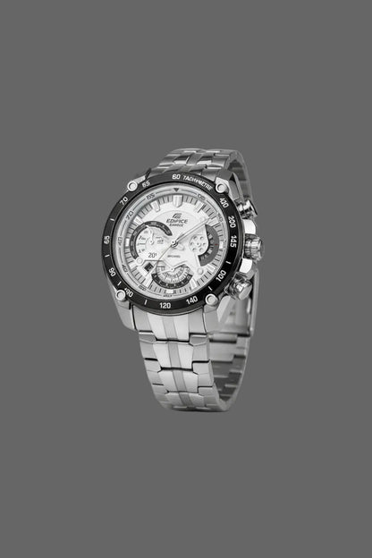 Silver-tone bracelet sport watch with a light dial and black numbered bezel.