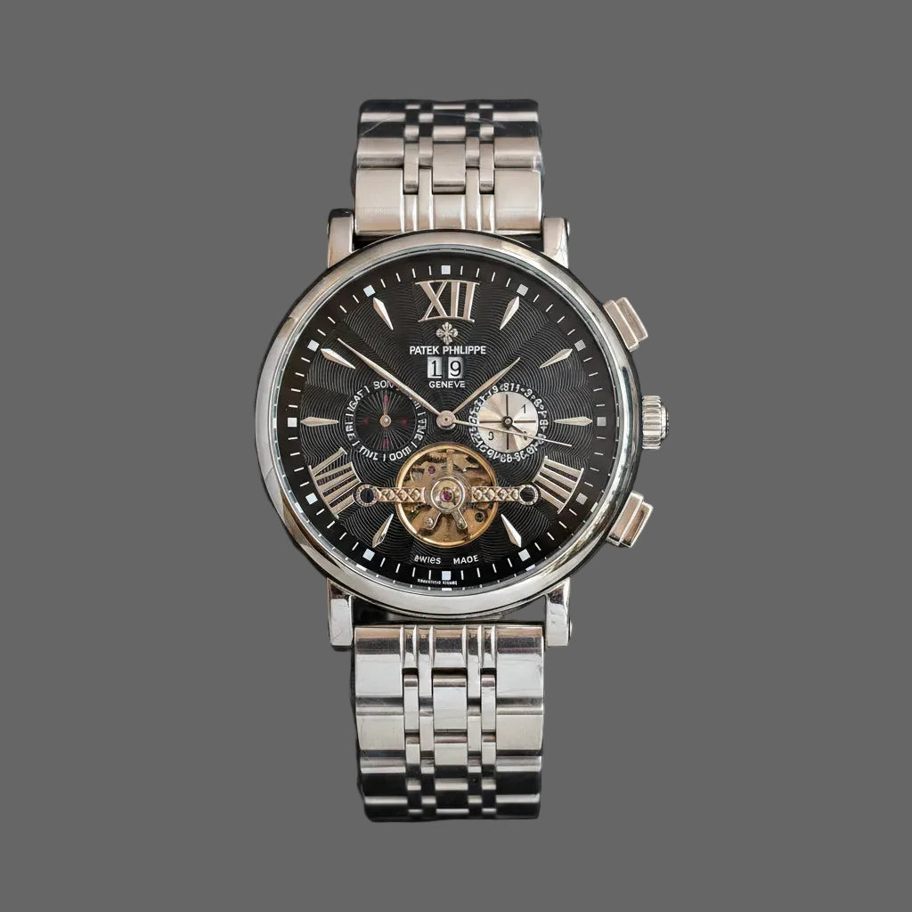 Silver-tone bracelet watch with a dark dial, Roman-numeral accents and an open-heart detail.